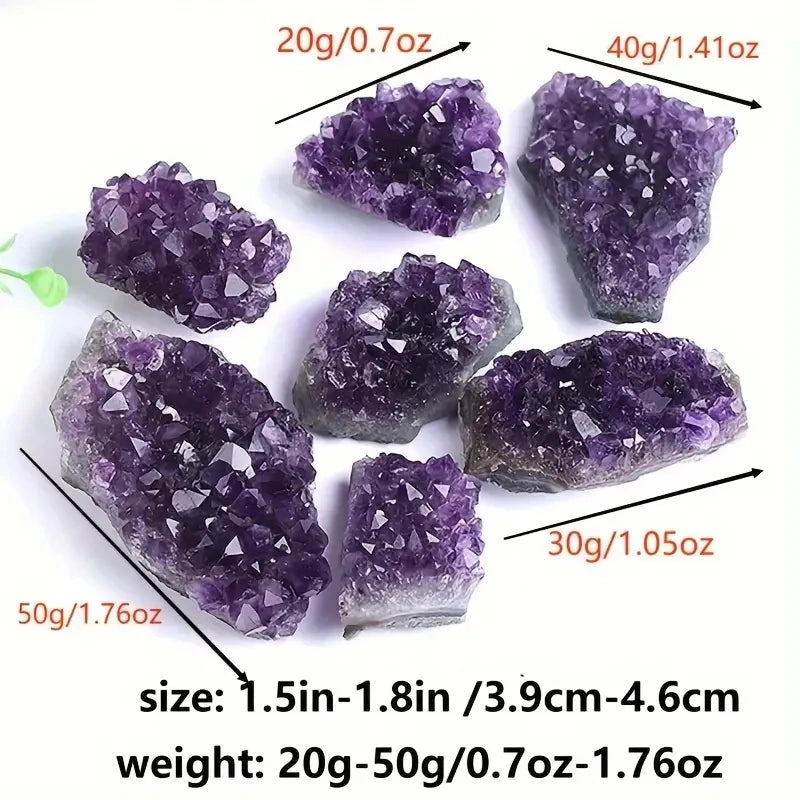 Assorted Amethyst crystal clusters shown together with a size and weight reference.