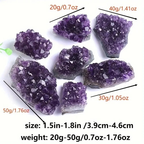 Assorted Amethyst crystal clusters shown together with a size and weight reference.