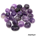 Assorted polished Amethyst tumbled stones in purple and violet tones on a white background.
