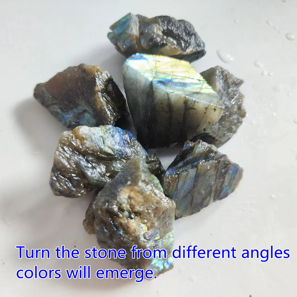Assorted rough Labradorite pieces showing blue and gold flashes, with angle-view guidance printed below.