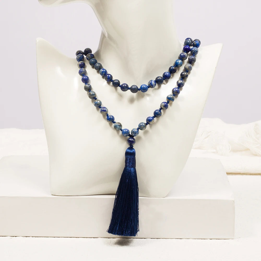 Lapis Lazuli mala worn as a long double-strand necklace on a white display bust.