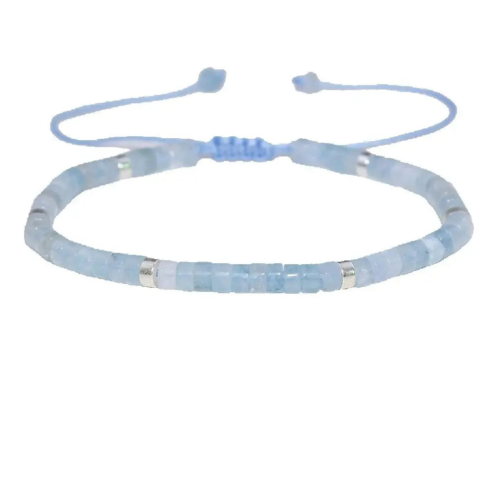 Aquamarine adjustable bead bracelet shown flat on a white background.